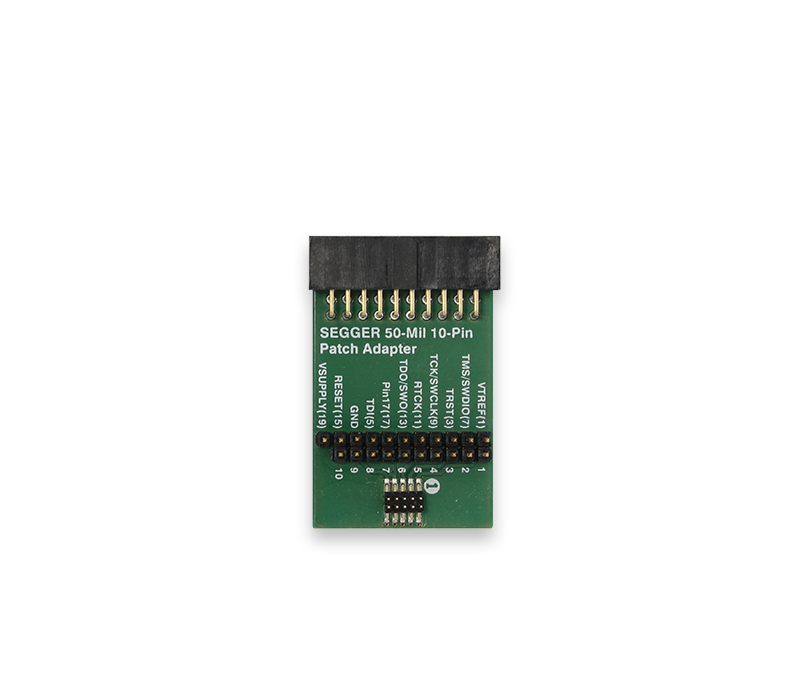 Image of a SEGGER 50-Mil 10-Pin Patch Adapter. The adapter is a small, rectangular green circuit board with a black connector on one end. It features labeled pins for connections, including RESET, GND, and TCK, providing interface capabilities for programming and debugging electronic devices.